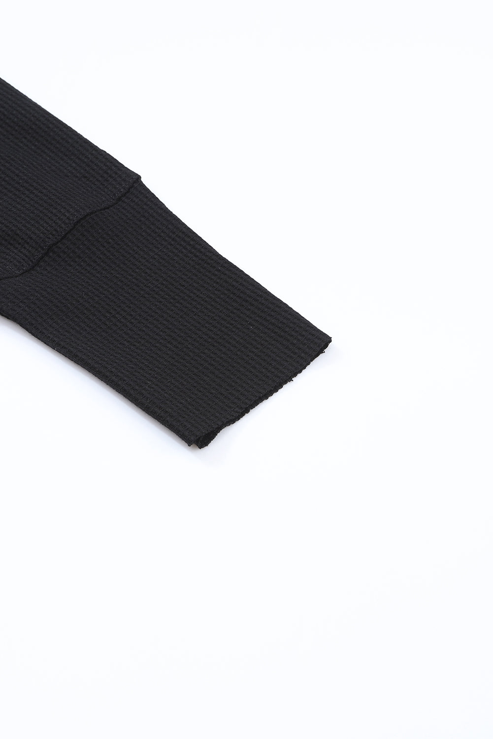 Haut Henley en tricot gaufré noir à encolure bordée