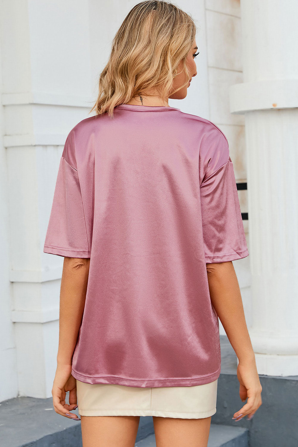 Ružičasta široka majica s džepovima na prsima