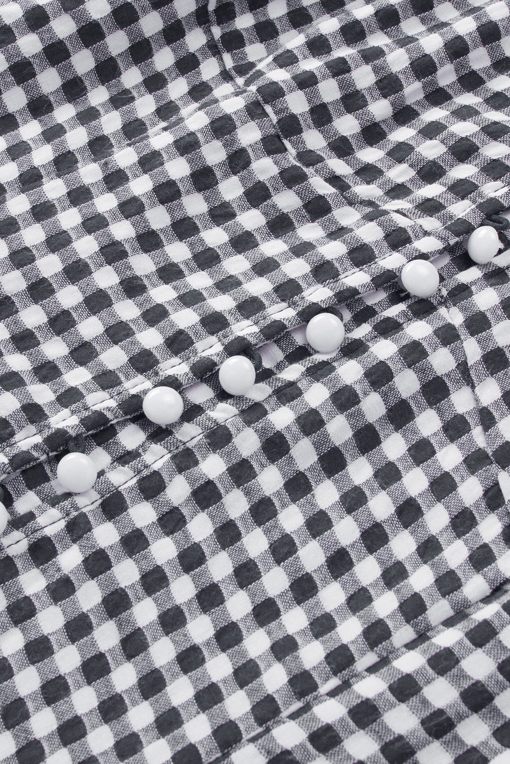 Schwarze, schulterfreie Bluse mit herzförmigem Gingham-Knöpfenmuster