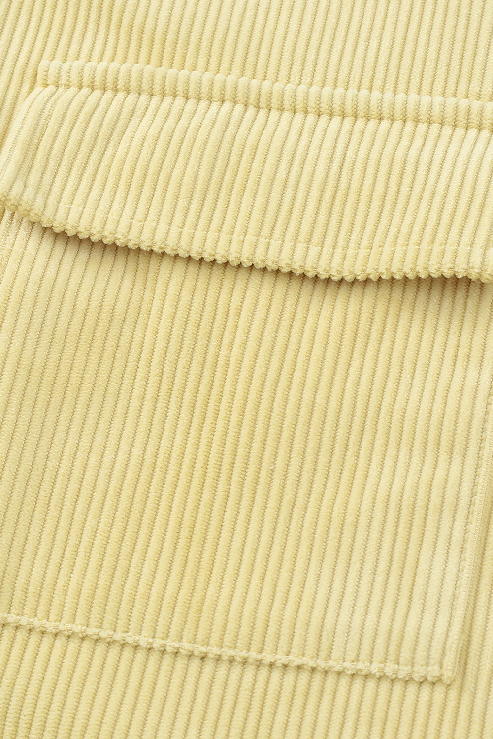 Veste beige texturée côtelée avec poches et boutons