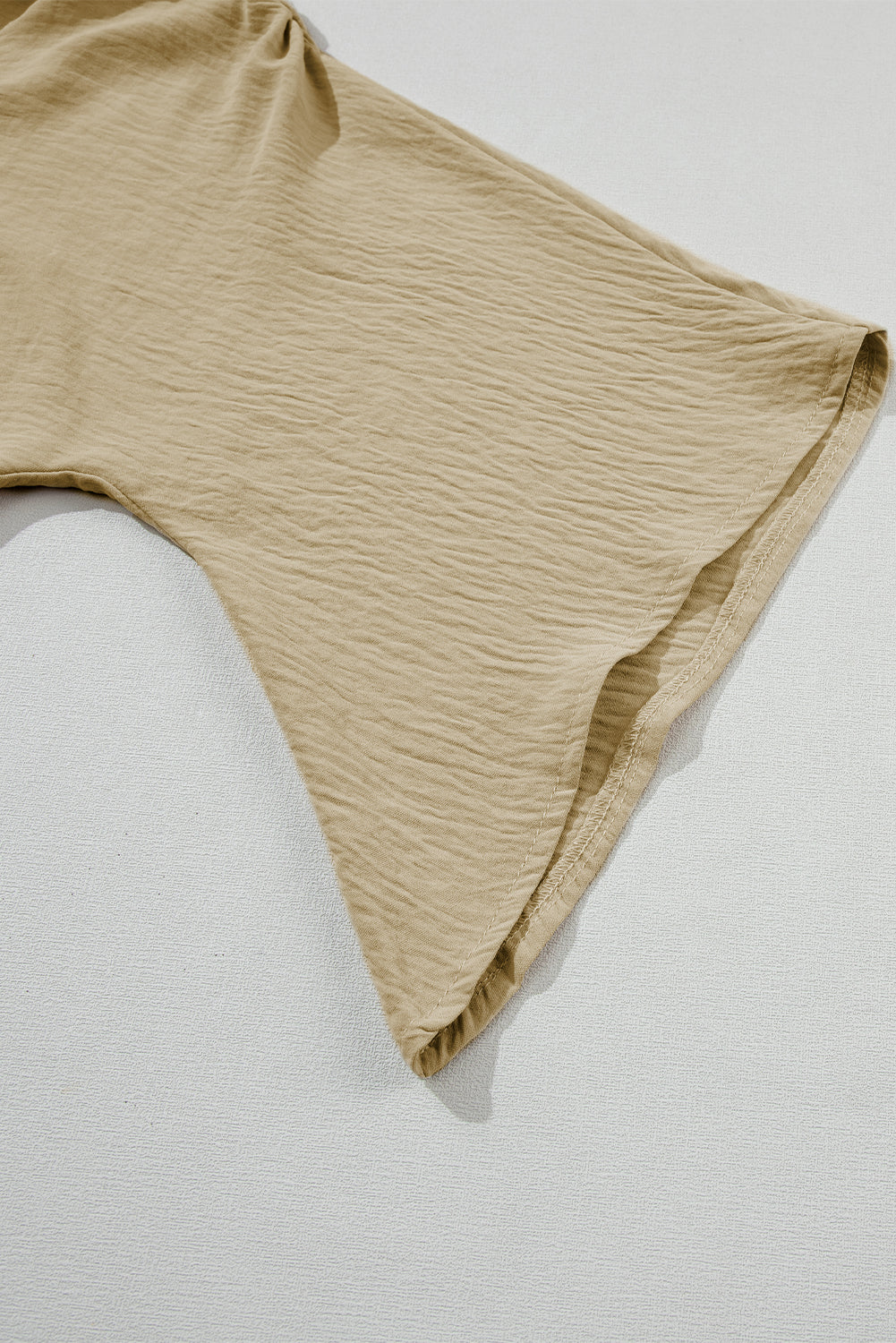 Parchment Solid V Neck Wide Sleeve Crinkled Blouse
