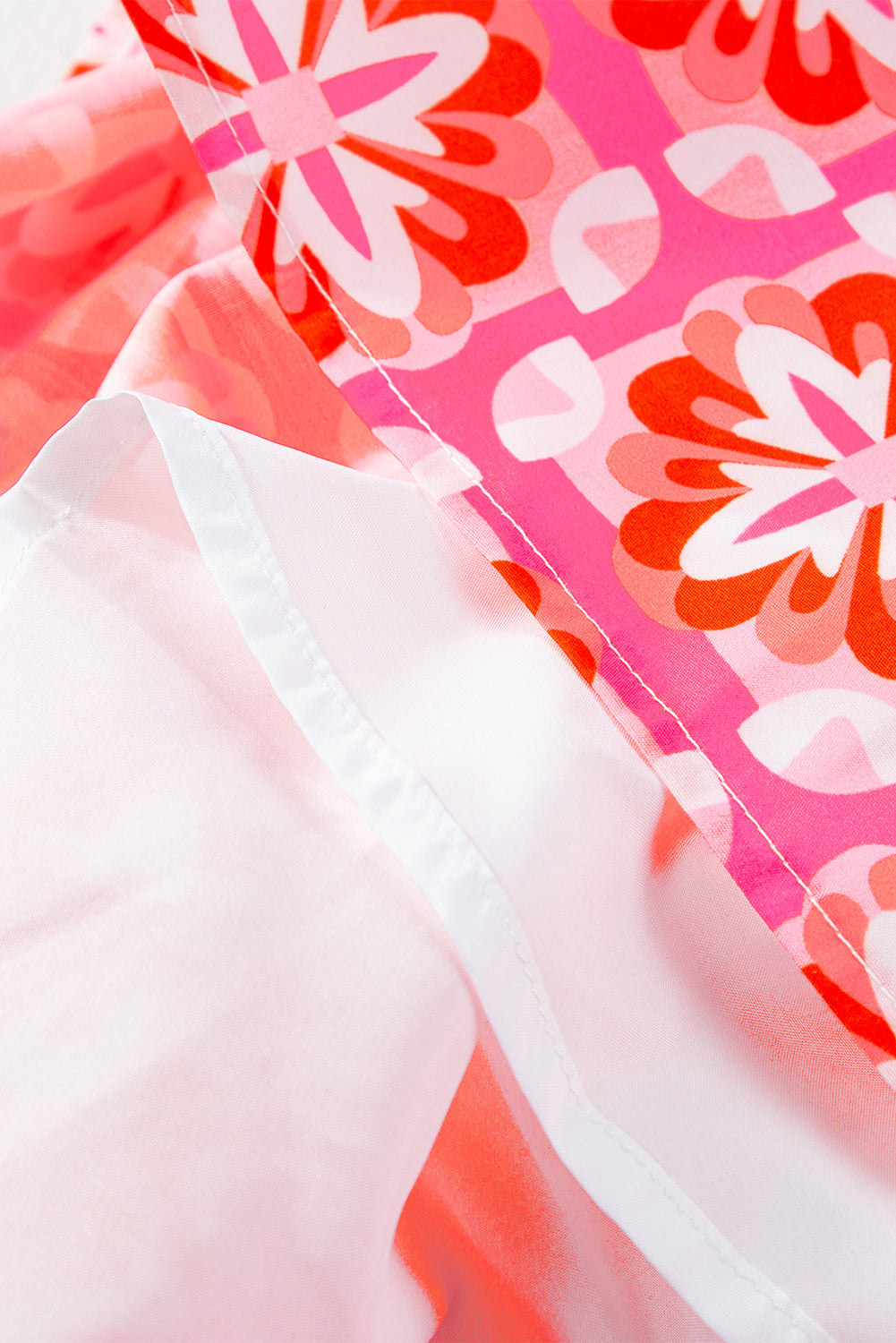 Ružičasta višeslojna haljina bez rukava s volanima i cvjetnim printom bez rukava