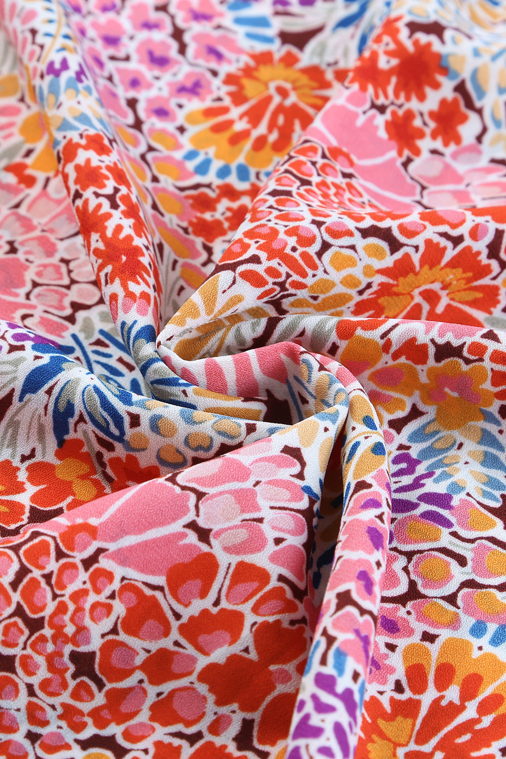 Chemisier multicolore à manches bulles et motifs floraux mélangés