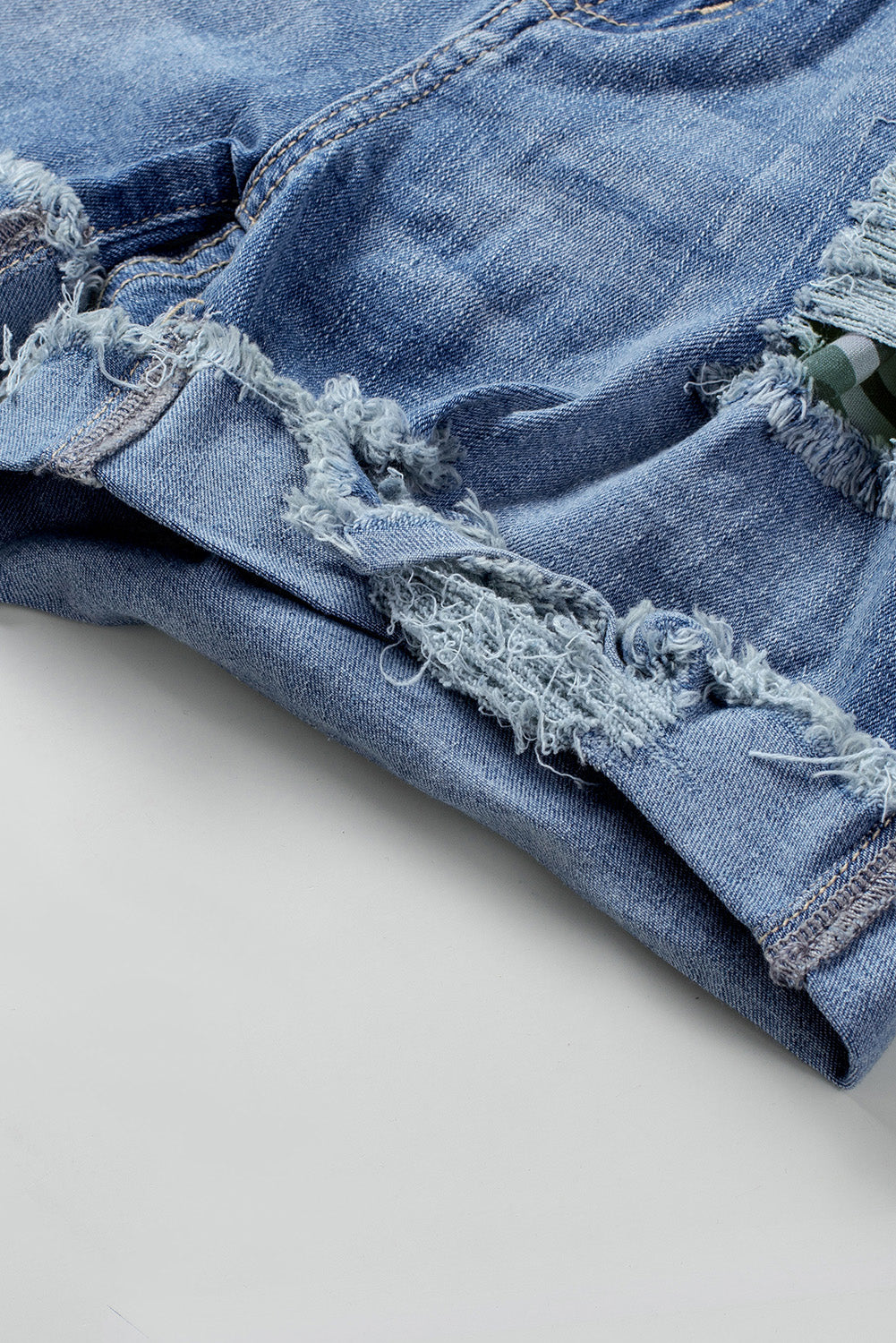 Lässige, florale Patchwork-Jeansshorts mit gerolltem Saum