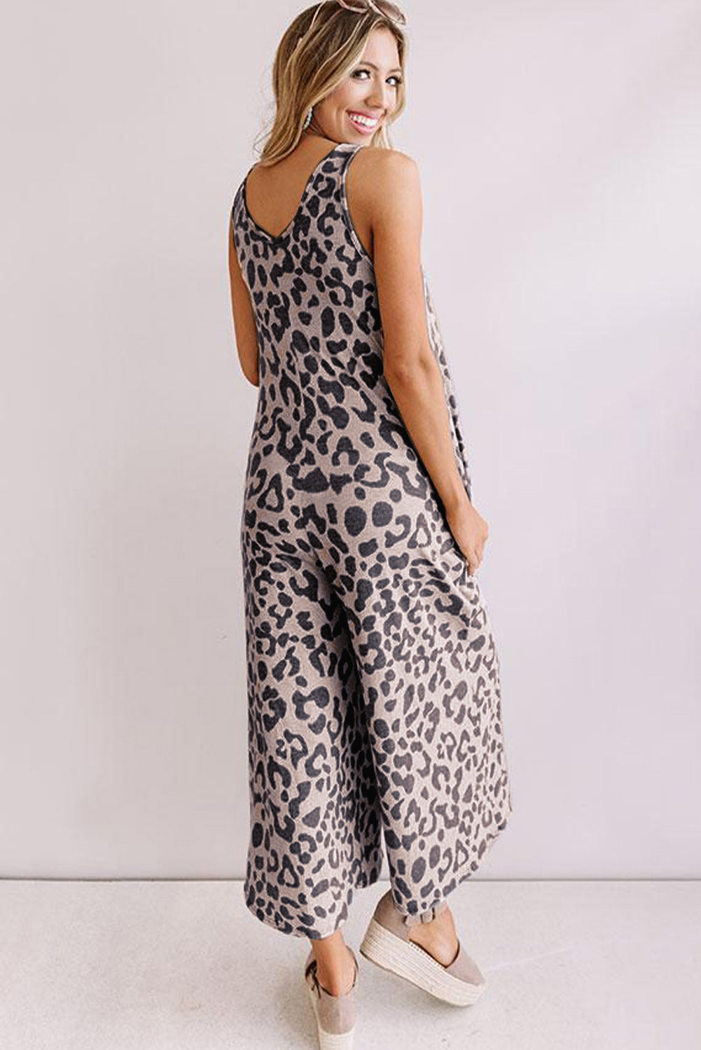 Combinaison sans manches à jambes larges et poches à imprimé léopard