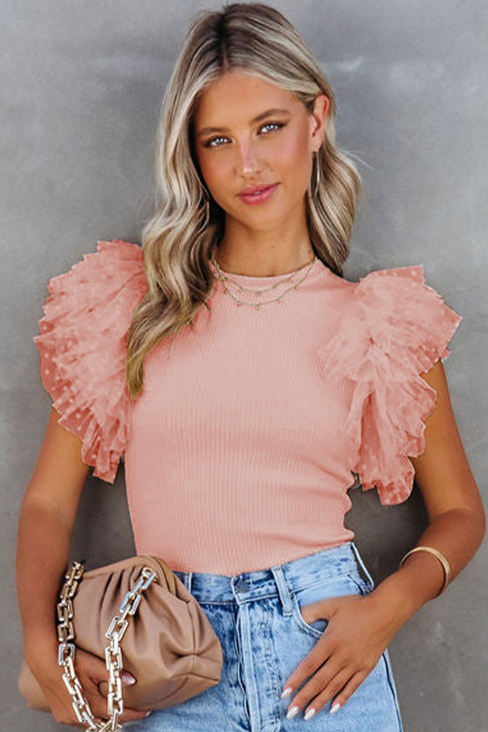 Rožnata pletena majica z mrežastimi rokavi in ​​naborki
