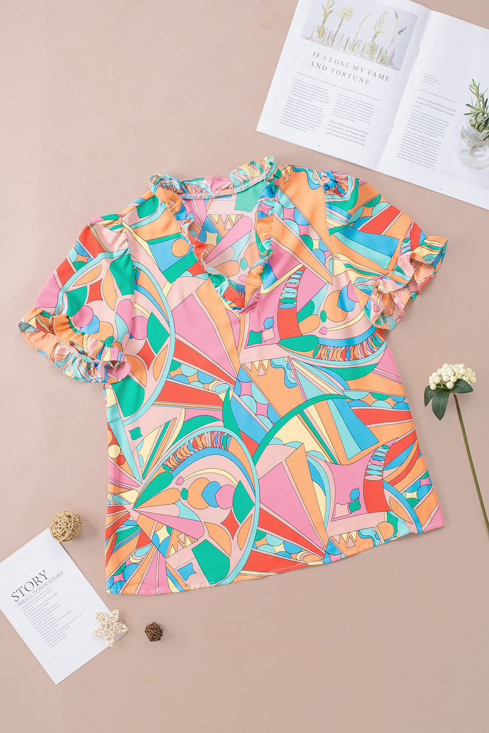 Bluza s V izrezom s višebojnim printom apstraktne geometrije