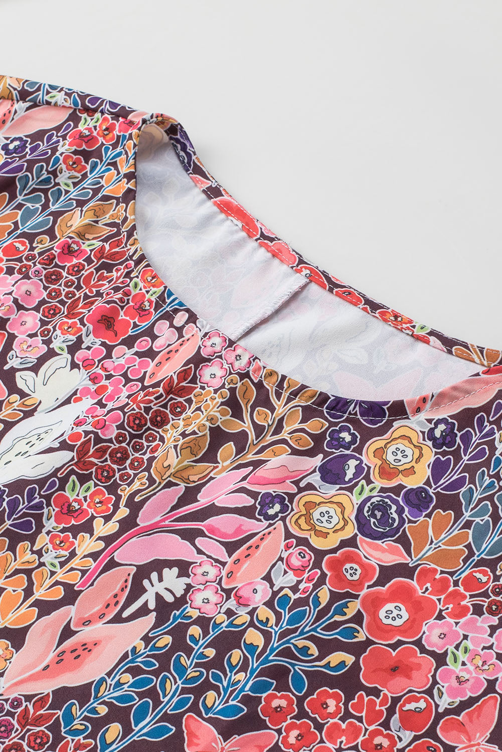 Večbarvna bluza tunika s 3/4 rokavi s cvetličnim potiskom