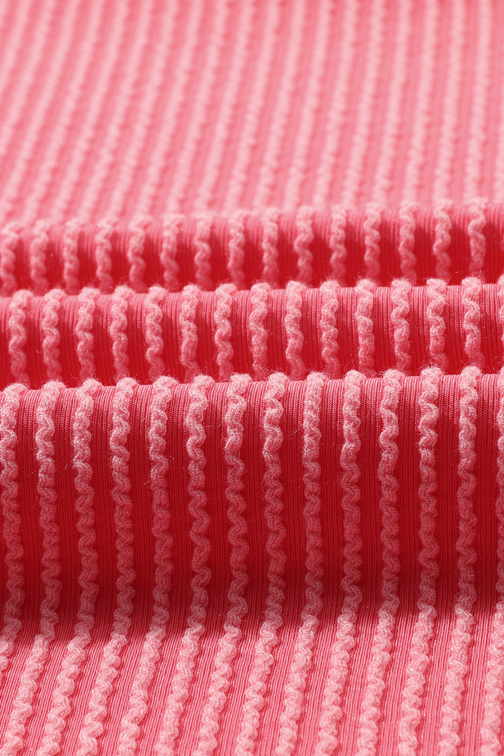 Top serafino rosa a maniche lunghe con tasche a coste taglie forti