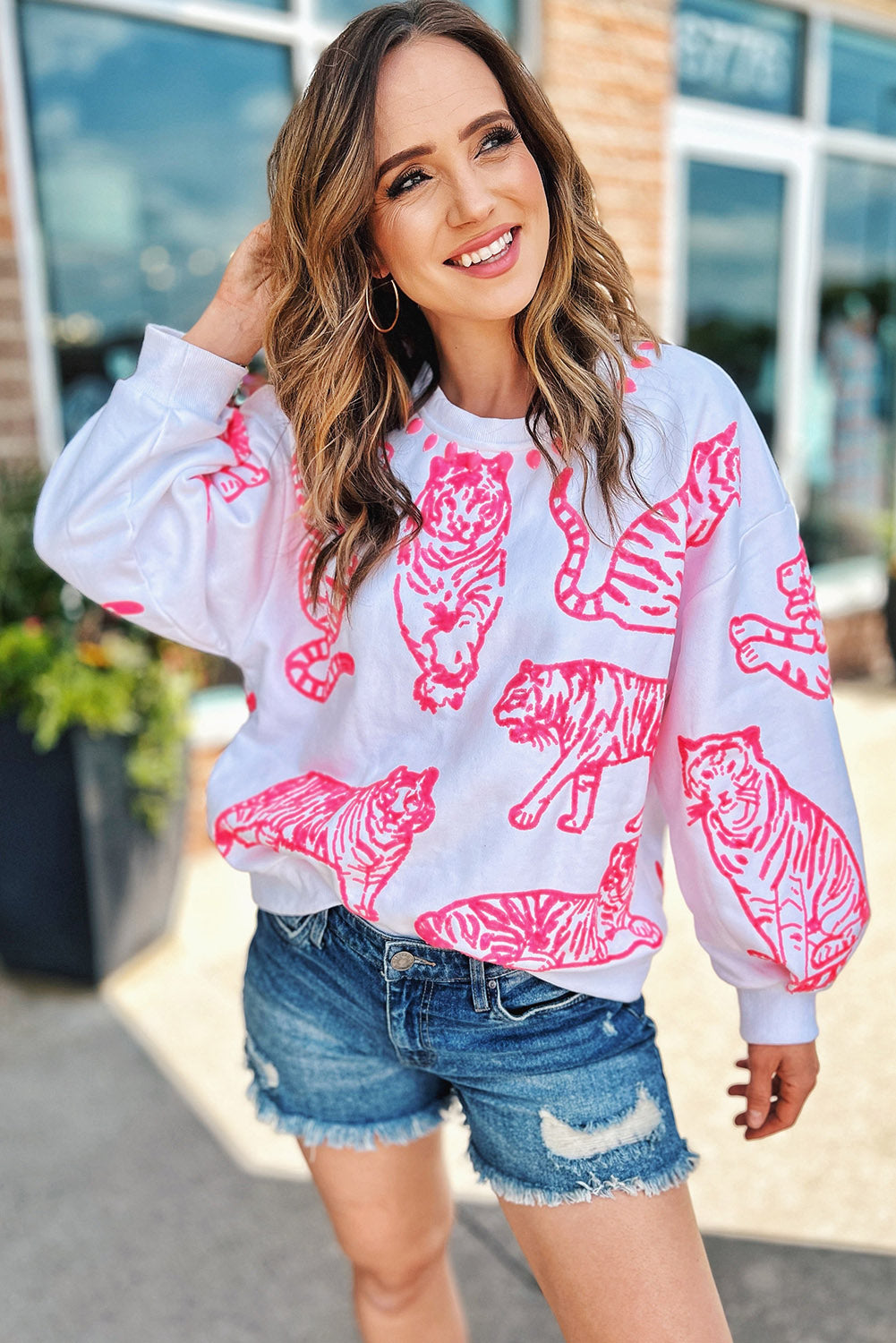 Hellweiß-rosafarbenes Pullover-Sweatshirt mit Animal-Print