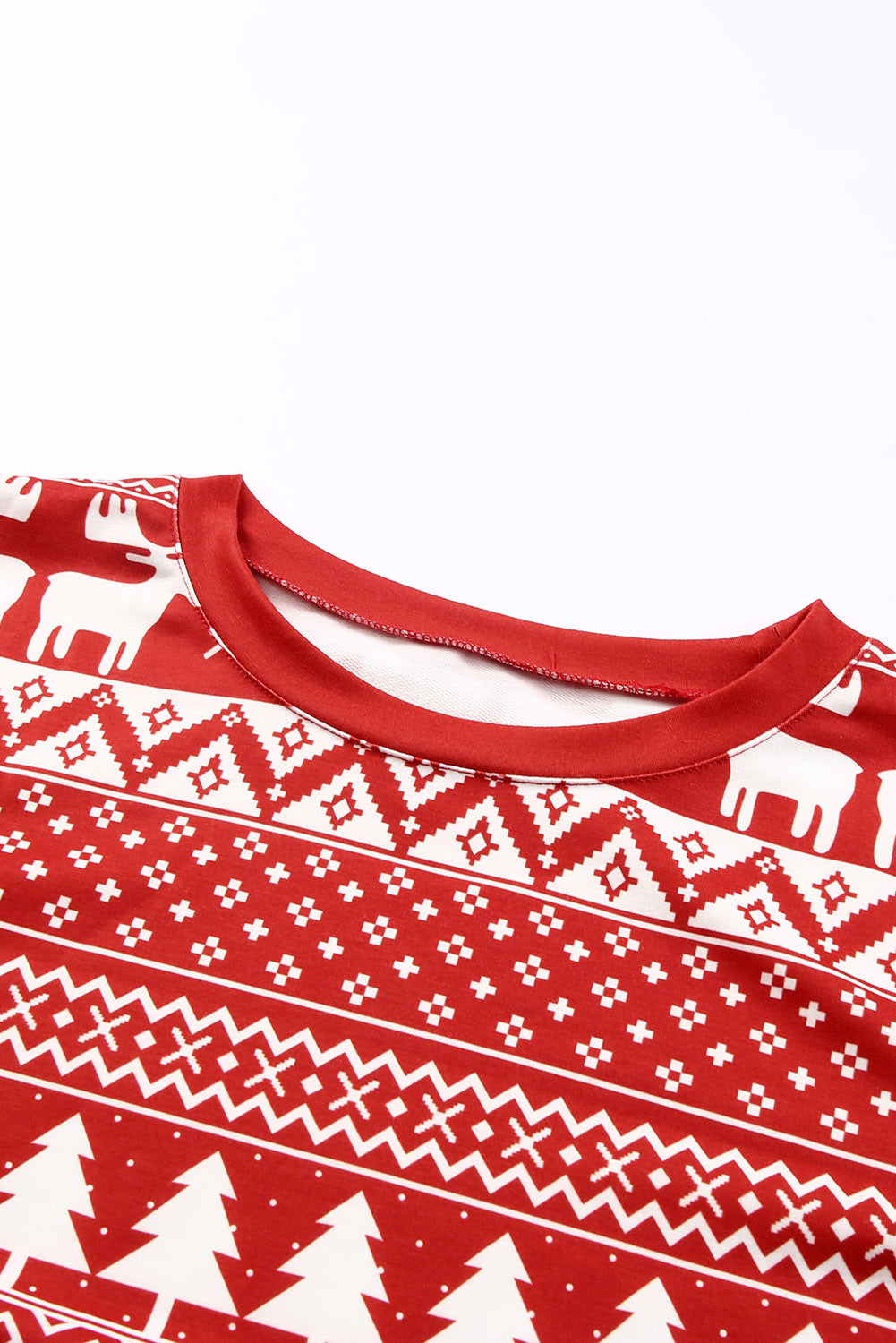 Ognjeno rdeči pulover v obliki severnih jelenčkov božičnega drevesa in salonski komplet hlač