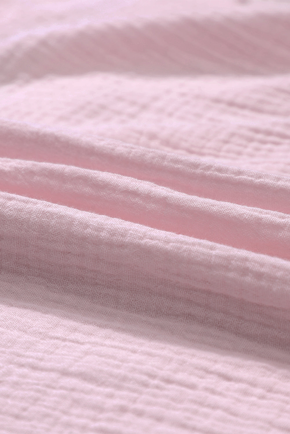 Top serafino rosa increspato a maniche lunghe con spacco invecchiato