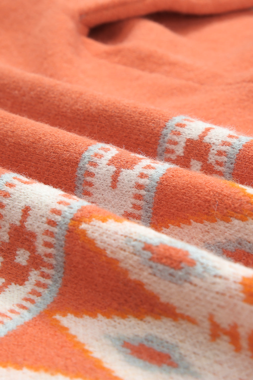 Cardigan tricoté orange imprimé aztèque ouvert sur le devant