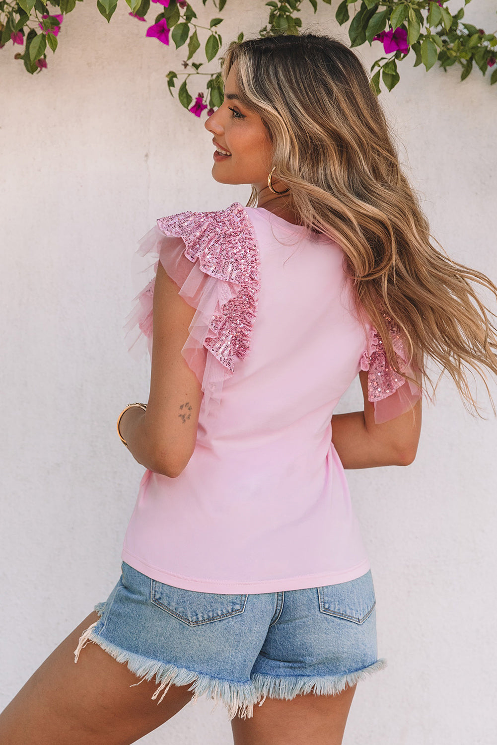 Rožnata majica z mrežastimi rokavi z bleščicami