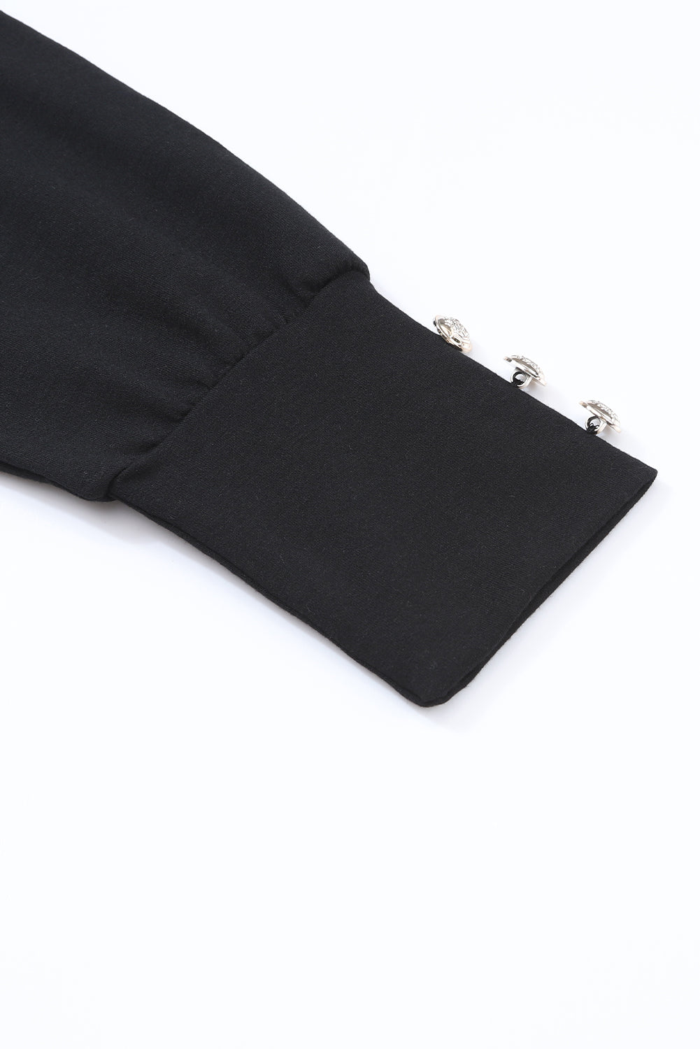 Crna asimetrična majica dugih rukava s kopčanjem