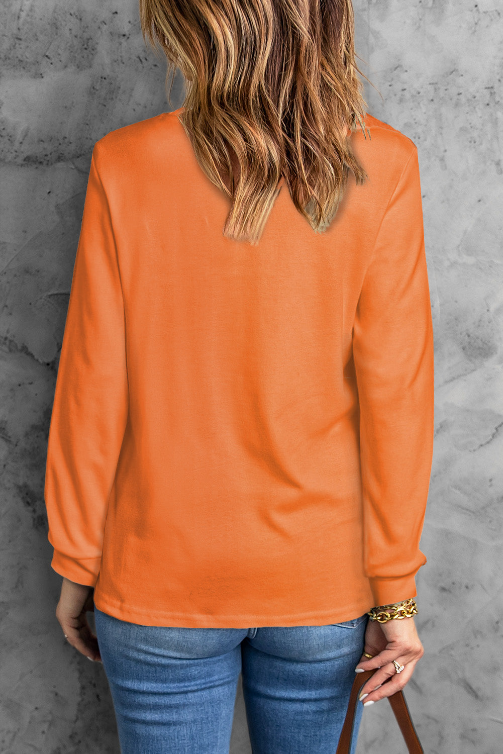 Oranžna majica z dolgimi rokavi z okroglim izrezom