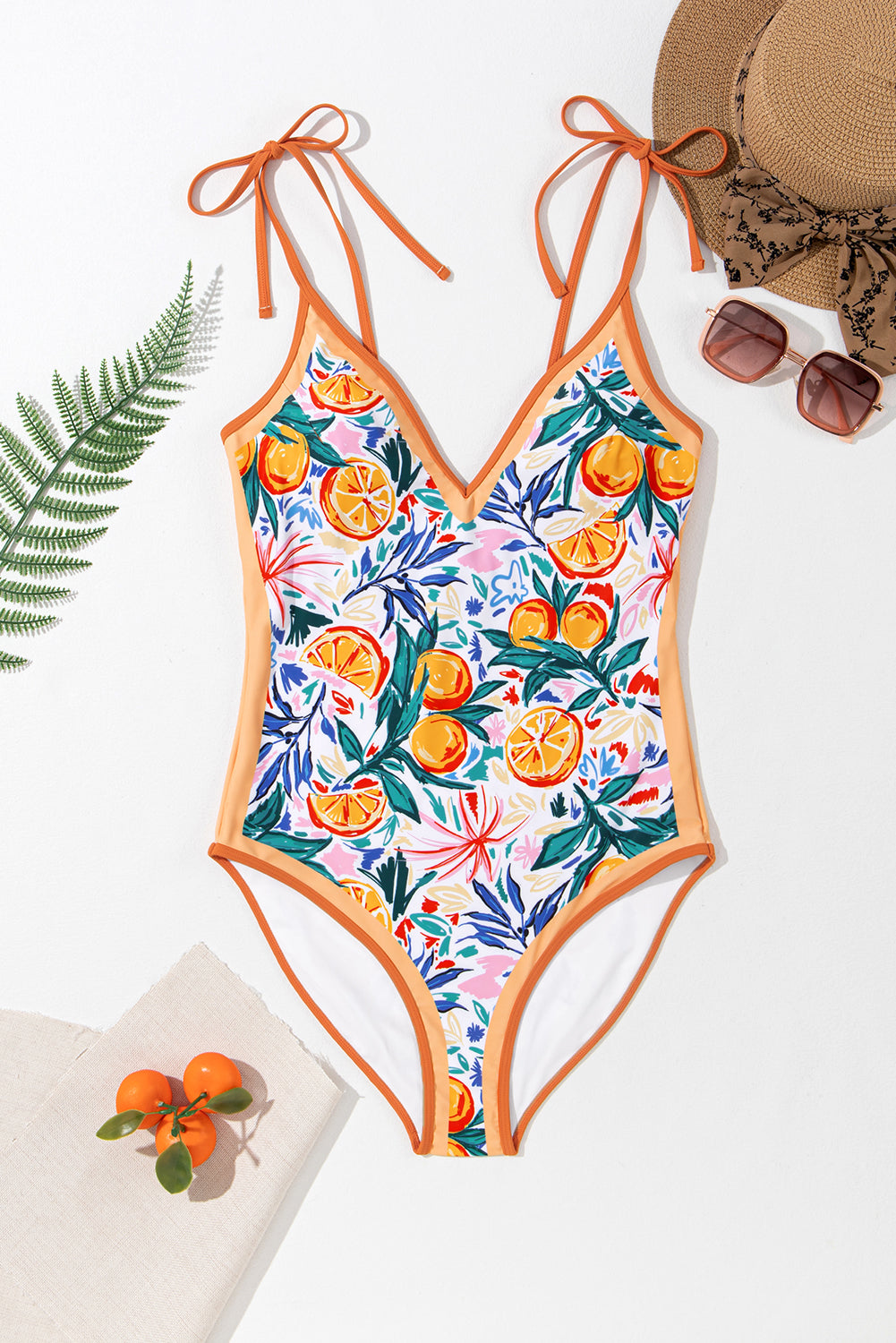 Jednodijelni kupaći kostim s vezanim naramenicama s V izrezom i printom biljke naranče