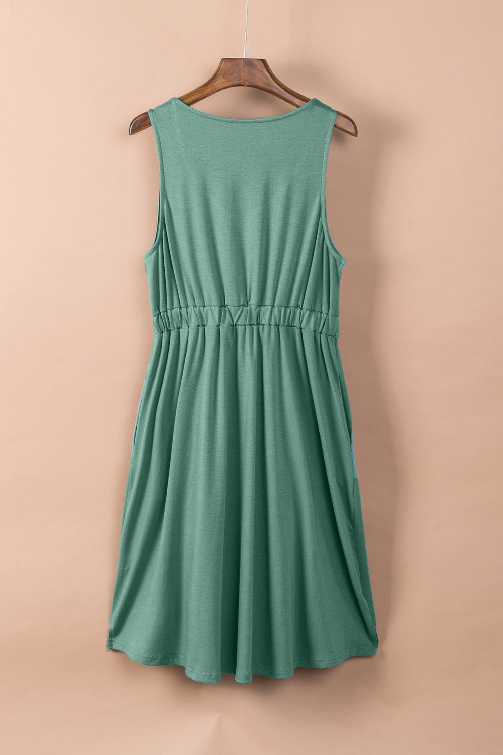 Mini-robe verte à boutons, sans manches, taille haute