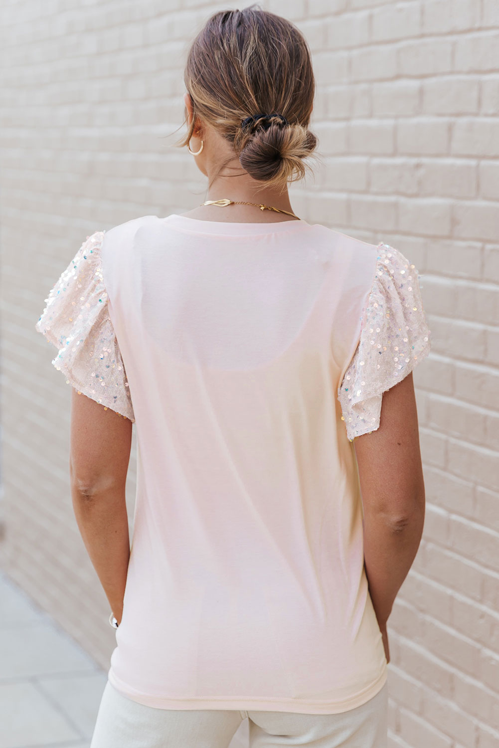 Rožnata majica s kratkimi rokavi in ​​okroglim izrezom z bleščicami