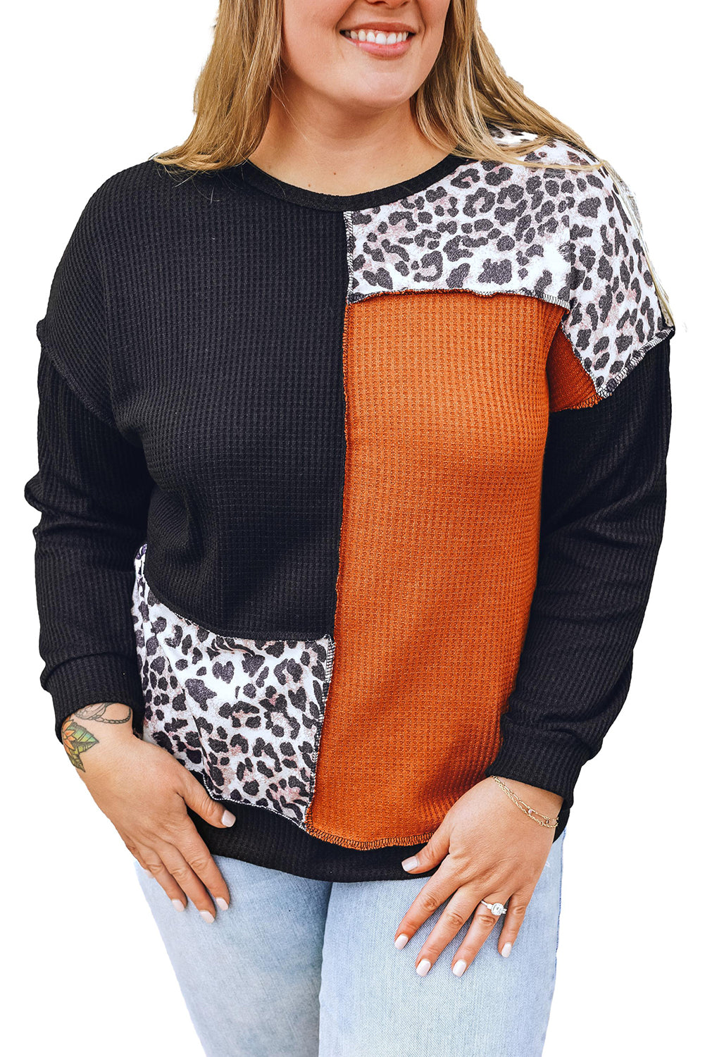 Haut en tricot gaufré patchwork léopard color block noir orange grande taille