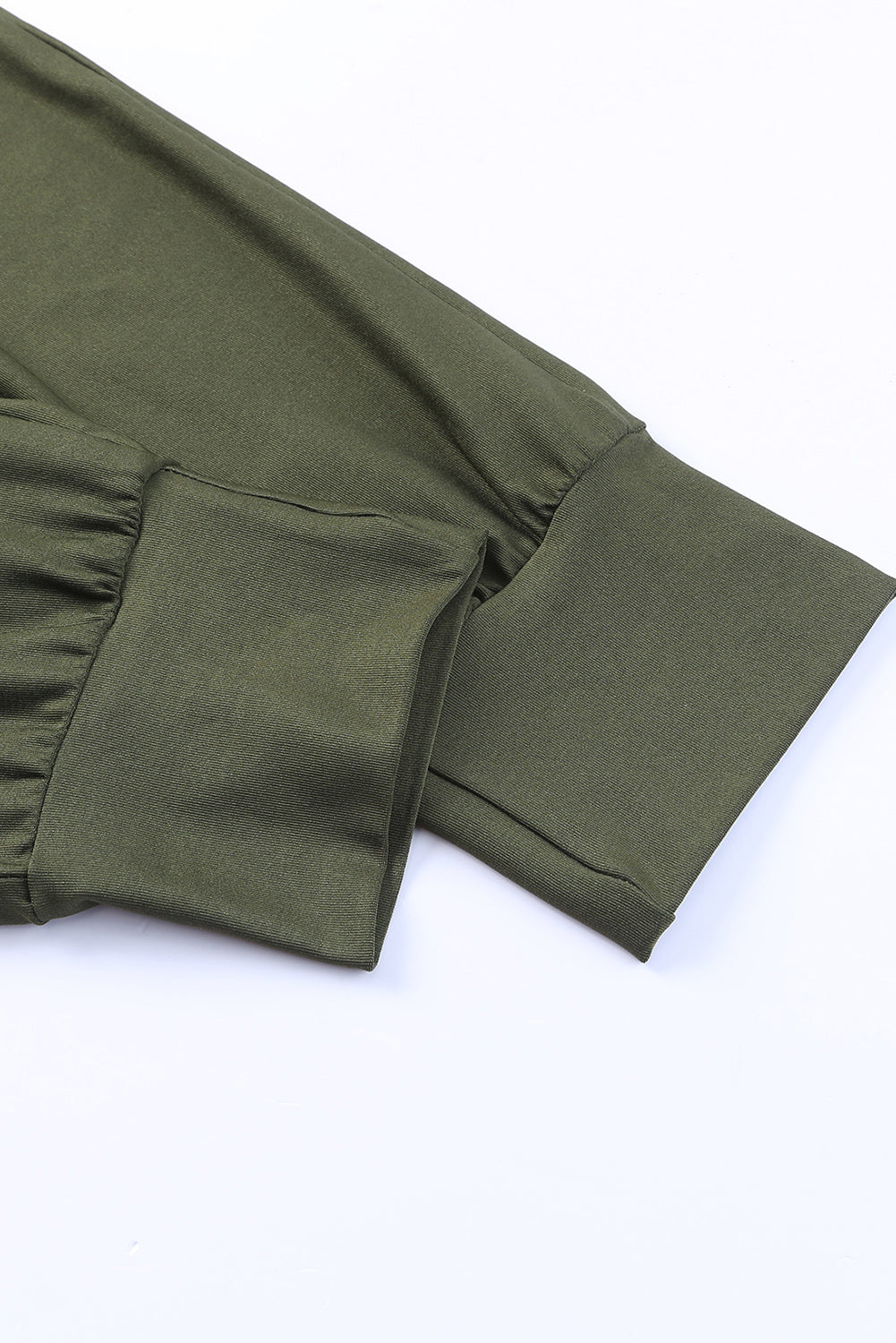 Zelene plisirane tajice s džepovima visokog struka