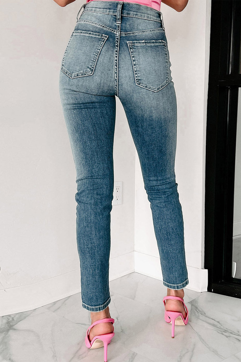 Jeans skinny strappati effetto consumato blu
