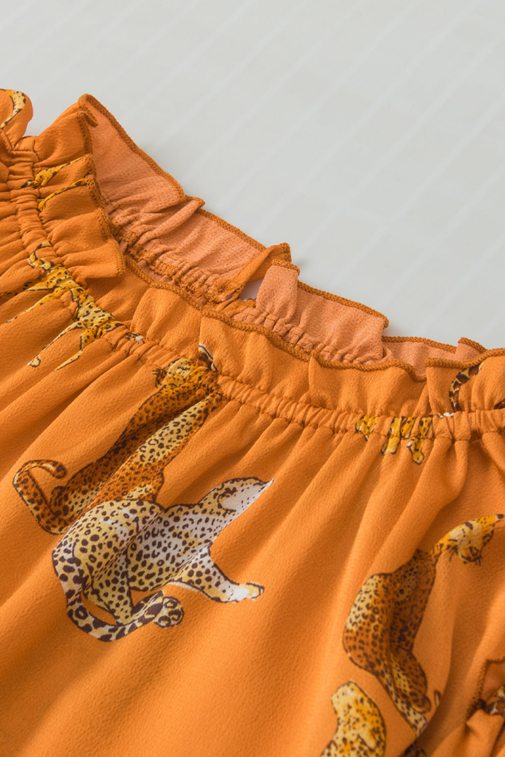 Camicetta con maniche a volant stampata ghepardo arancione