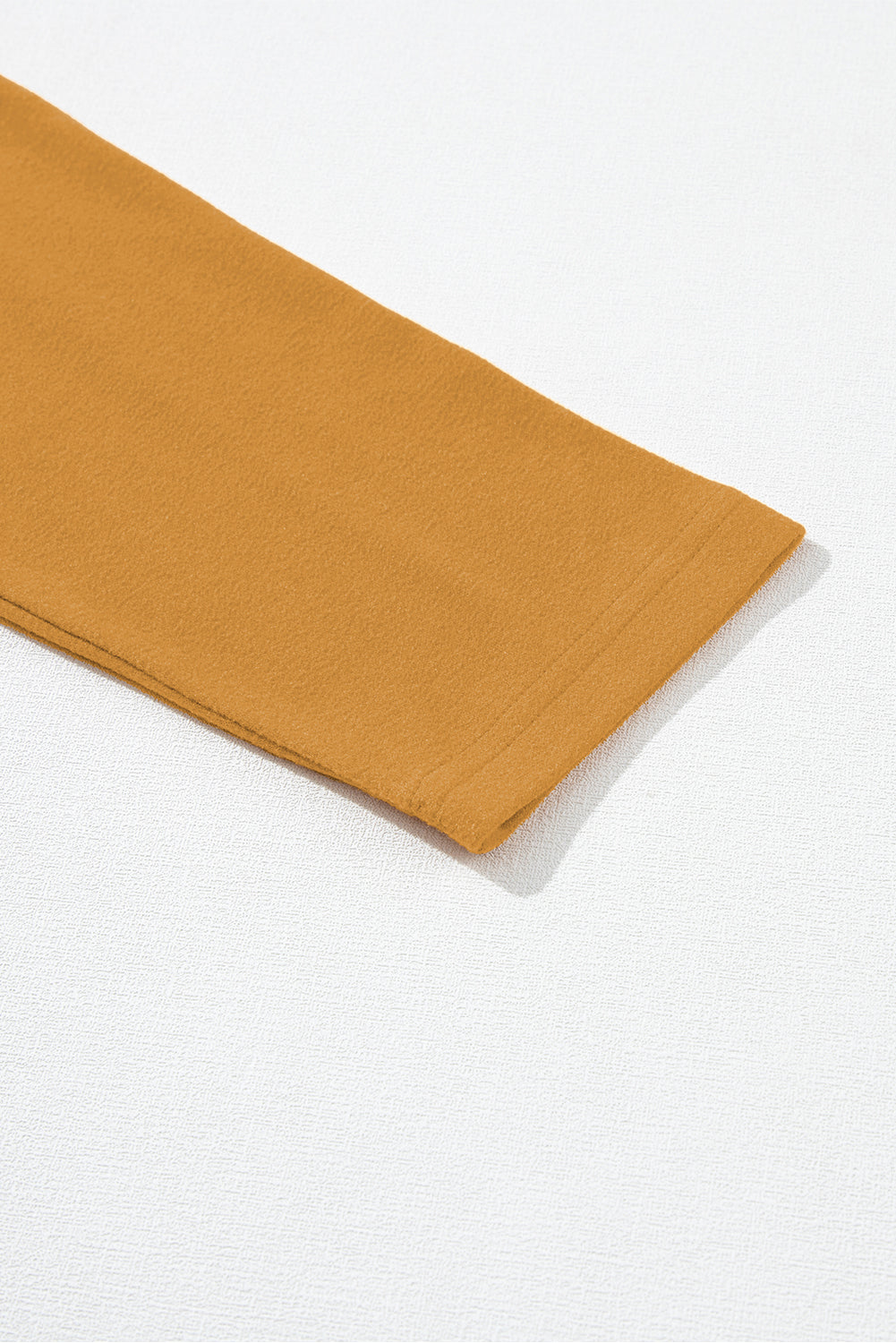 Haut à manches longues en tricot color block beige français clair à coutures apparentes