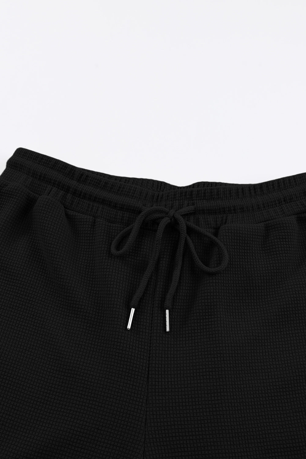 Pantaloni jogger con tasca cargo con texture waffle nera