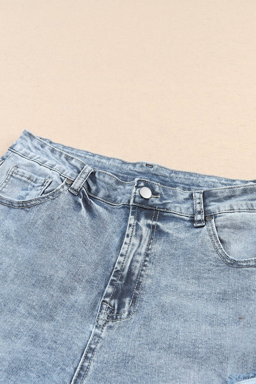 Jeans slim fit sfilacciati a vita alta blu navy con lavaggio chiaro