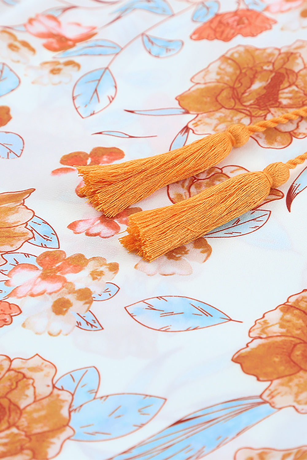 Orangefarbene Dolman-Bluse mit geteiltem V-Ausschnitt und Blumendruck