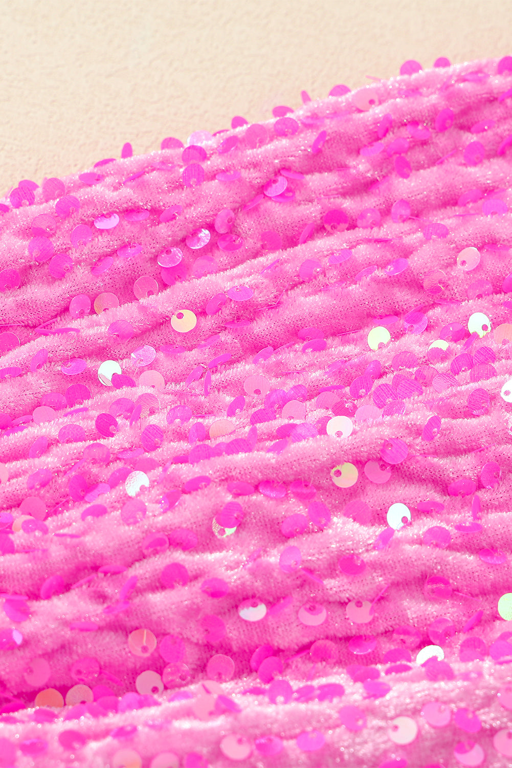 Top pullover a maniche lunghe patchwork di paillettes rosa