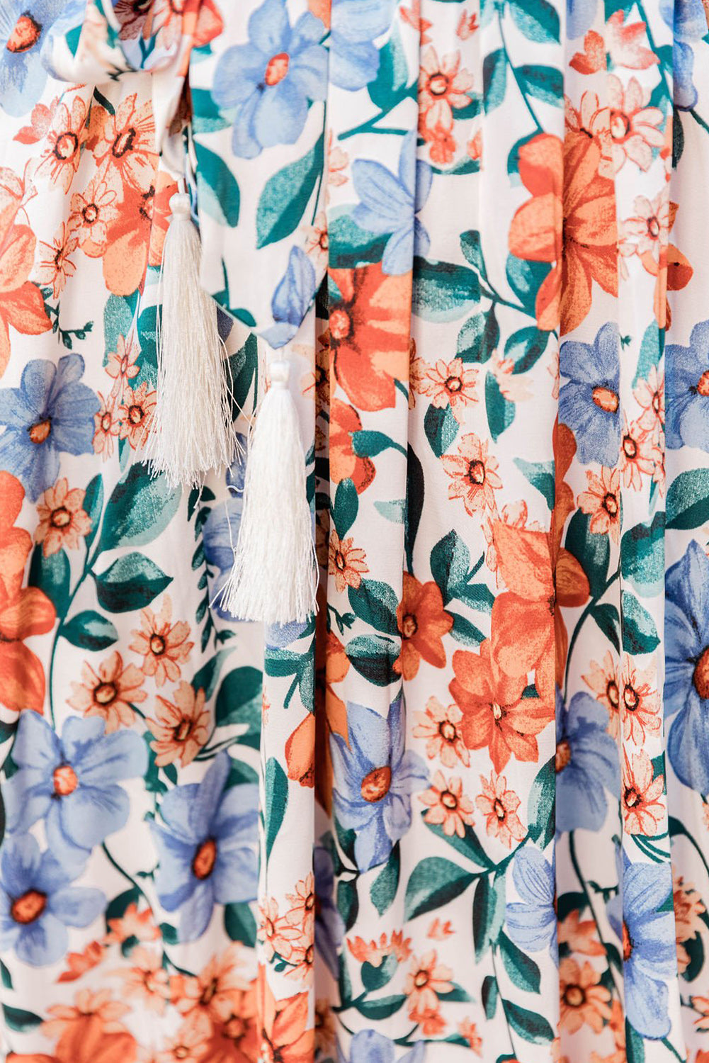 Robe longue portefeuille à imprimé floral et ceinture bleu ciel