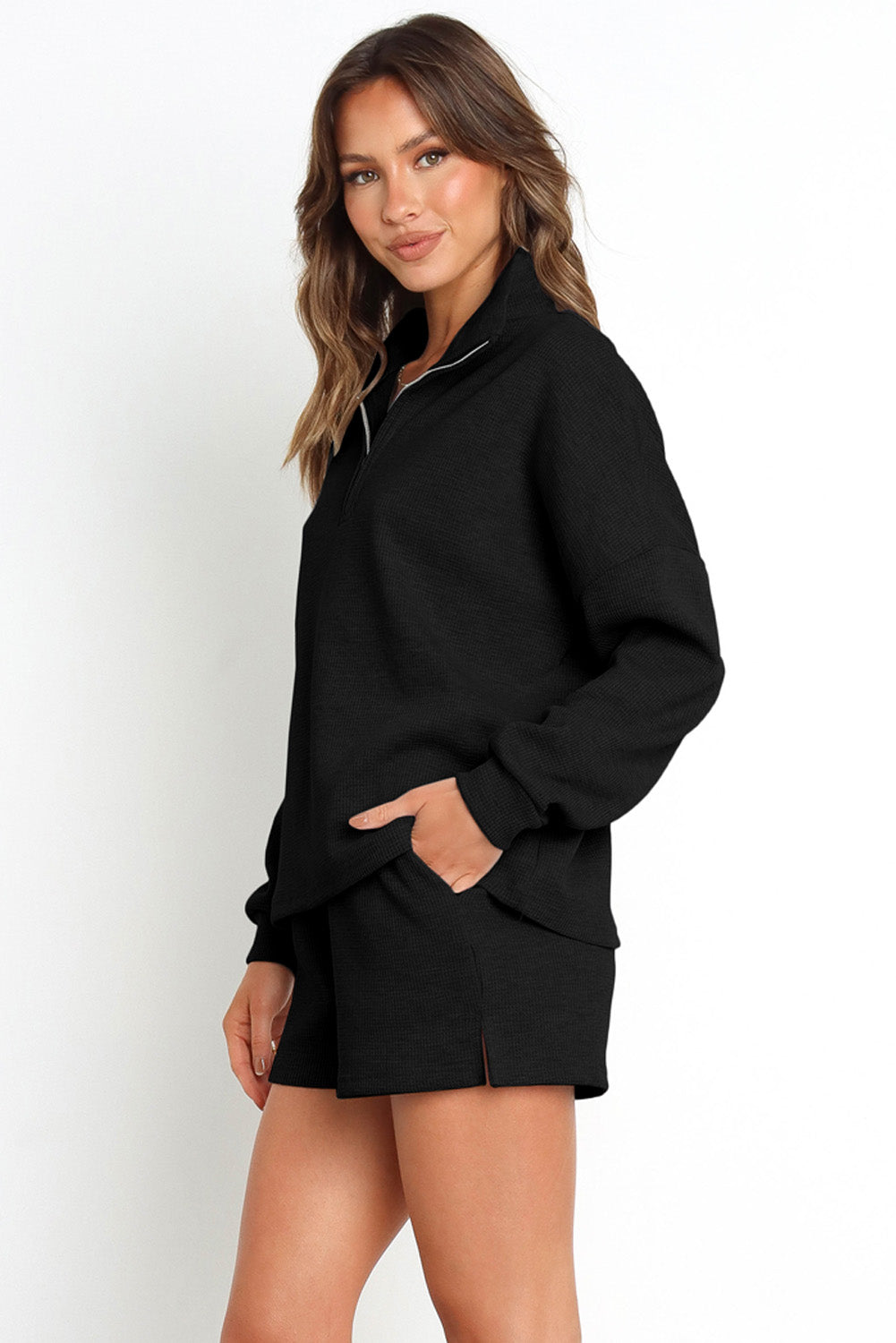 Ensemble sweat-shirt zippé côtelé noir et short taille haute