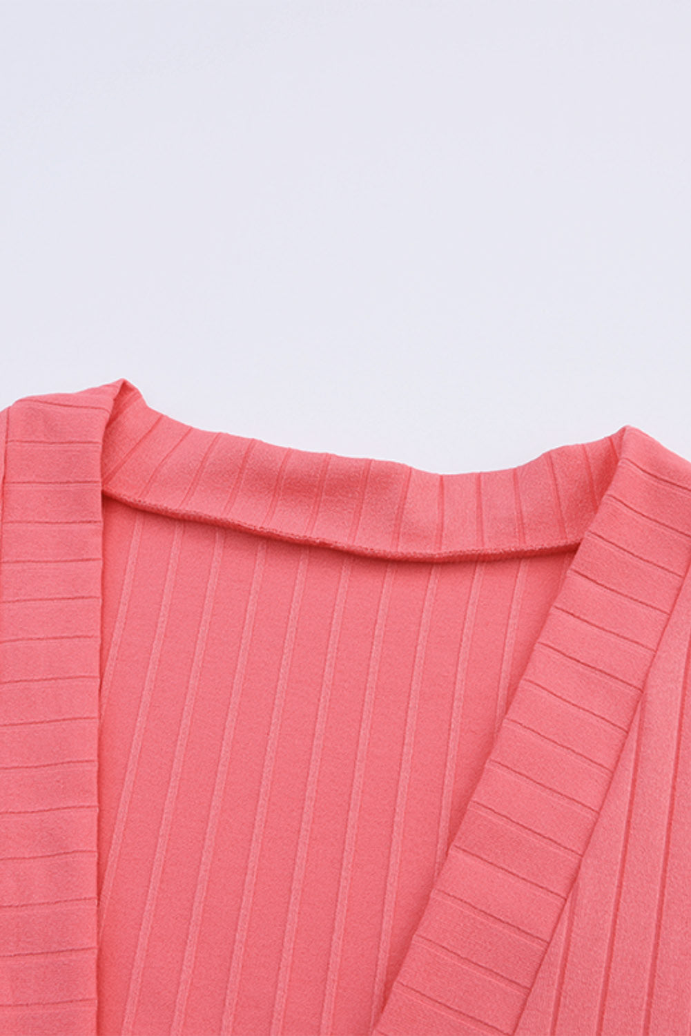 Cardigan in maglia rosa con tasca frontale aperta