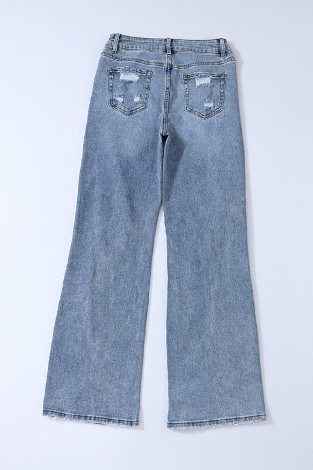 Himmelblaue Destroyed-Jeans mit weitem Bein und offenem Knie