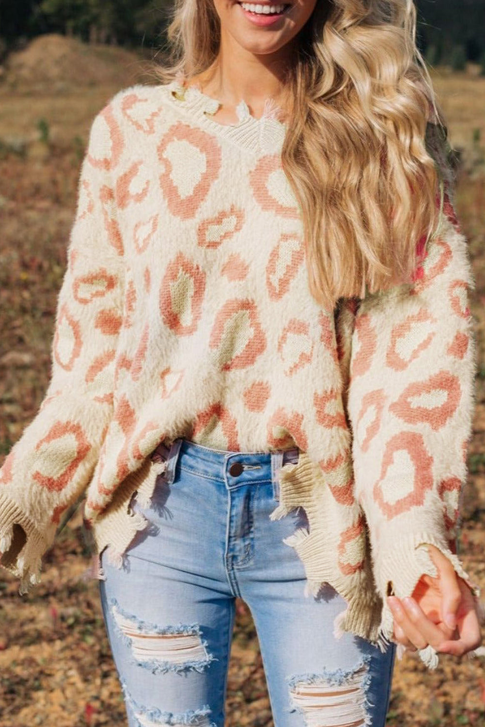 Nejasen pulover z leopardjim živalskim vzorcem