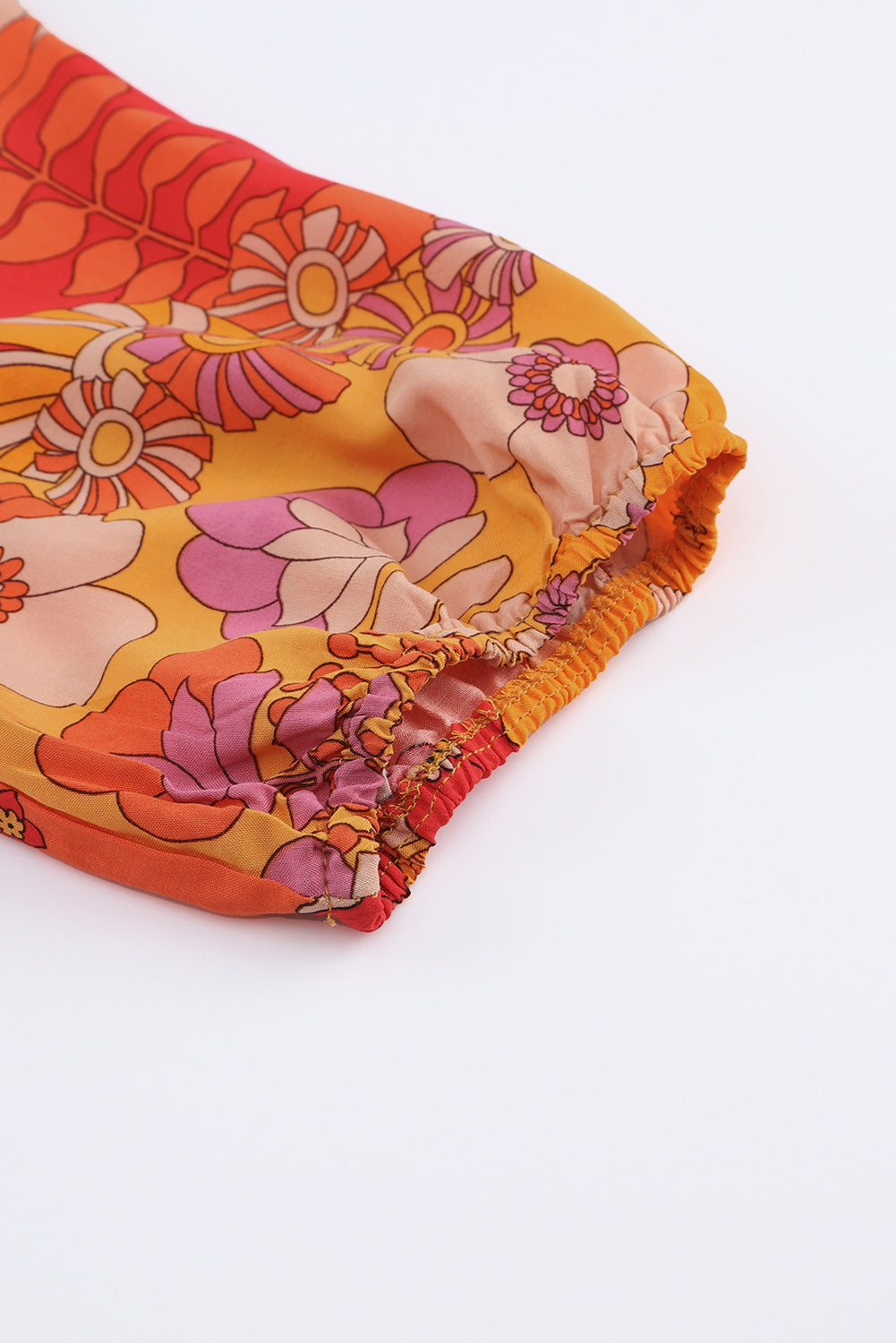 Robe longue orange bohème florale à taille smockée avec fente