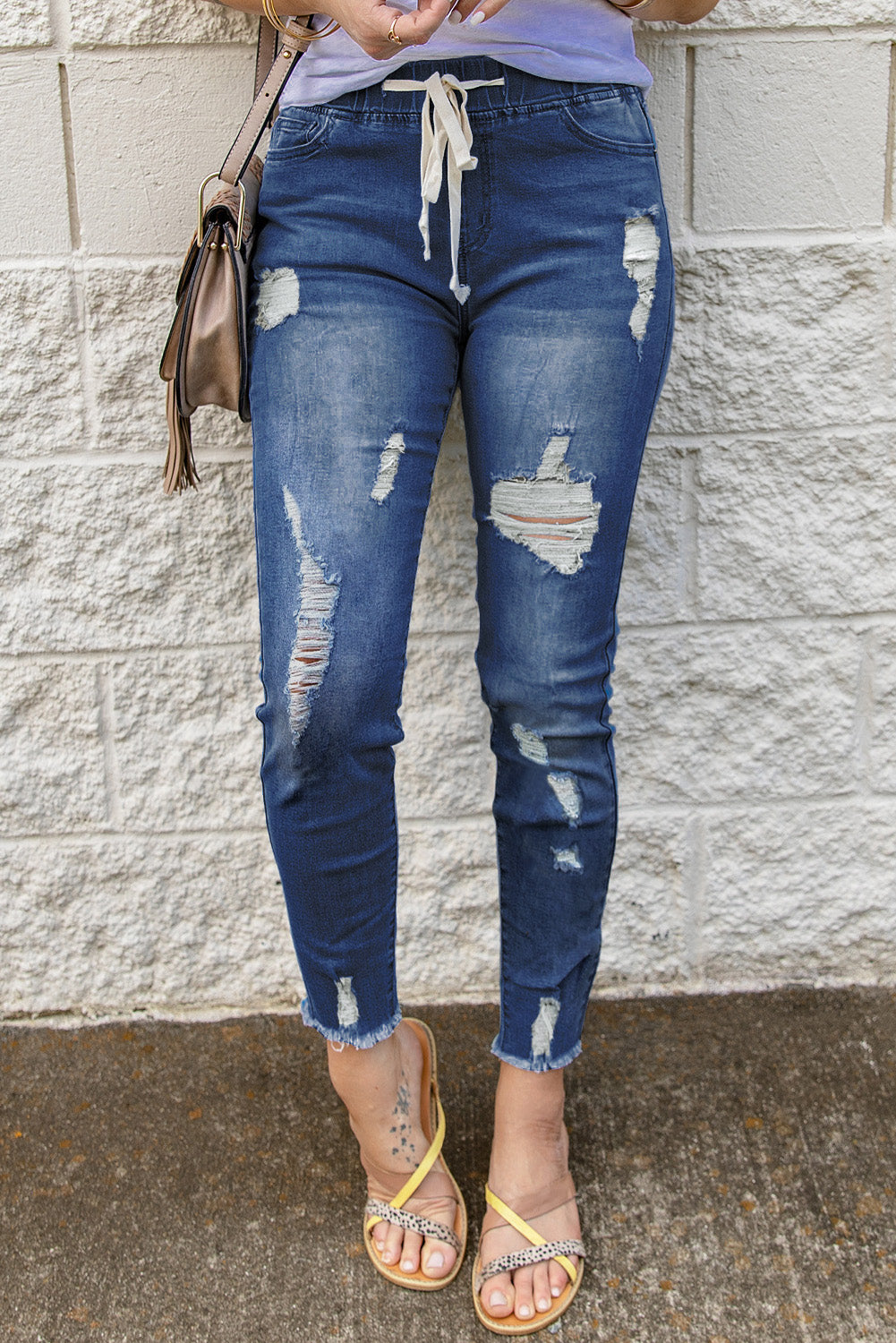Jeans strappati con foro in vita elastico con coulisse blu