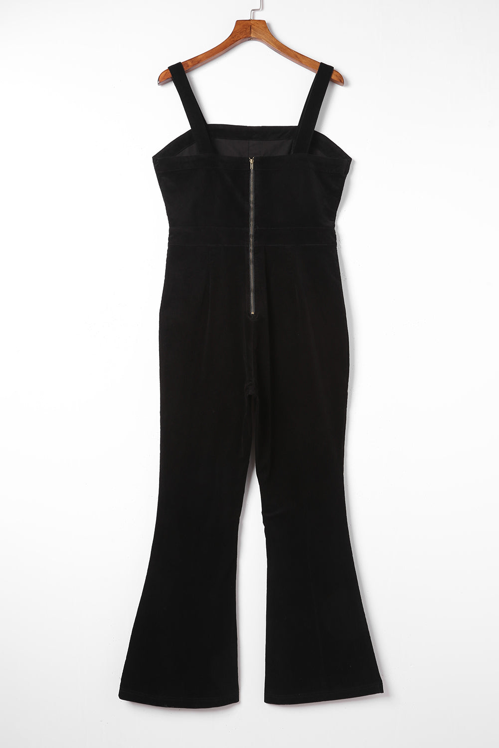 Combinaison noire en velours côtelé à jambe large et corsage boutonné sans manches