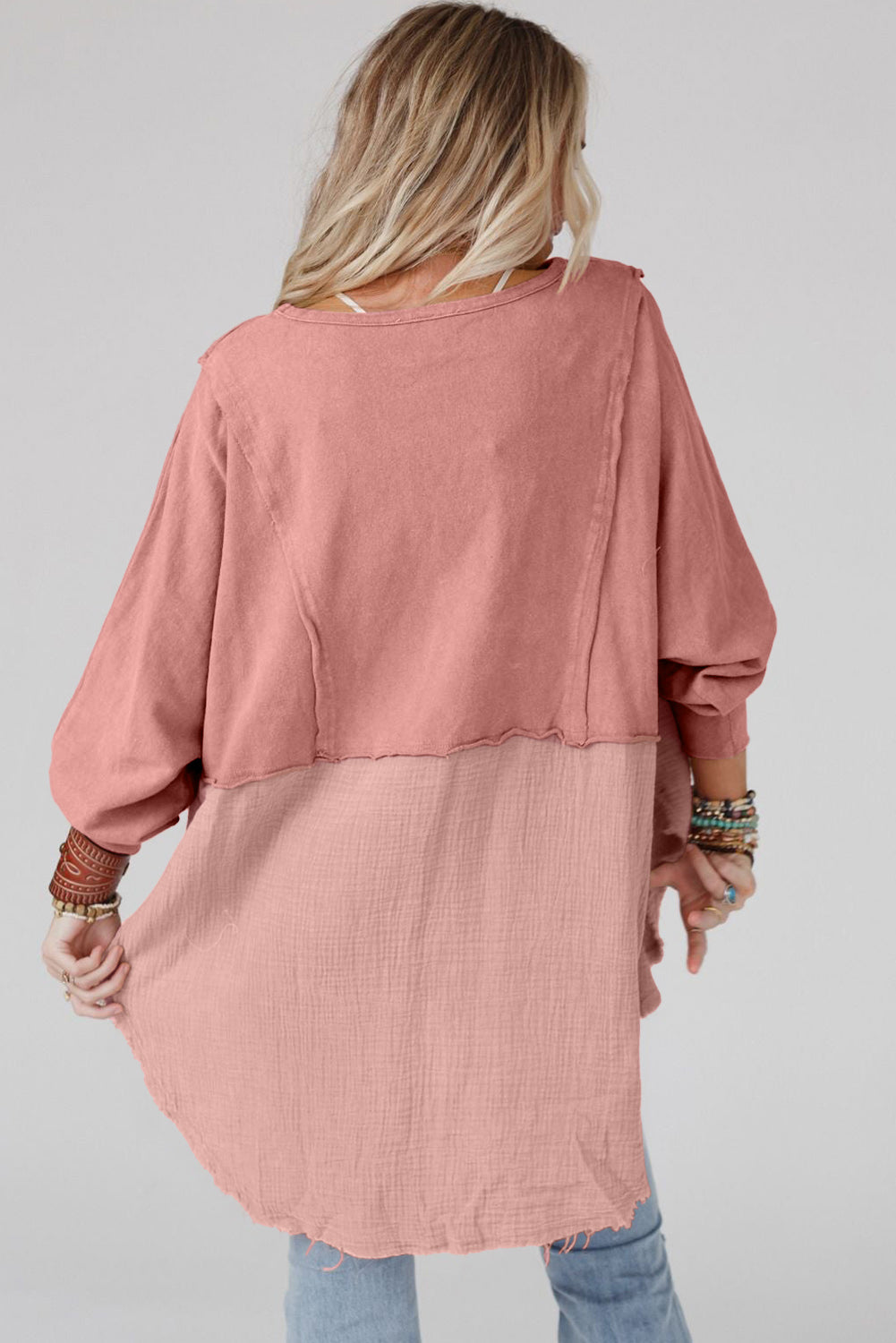 Rosafarbene Crinkle-Spleiß-Bluse mit rohem Saum und hohem, tiefem, übergroßem Oberteil