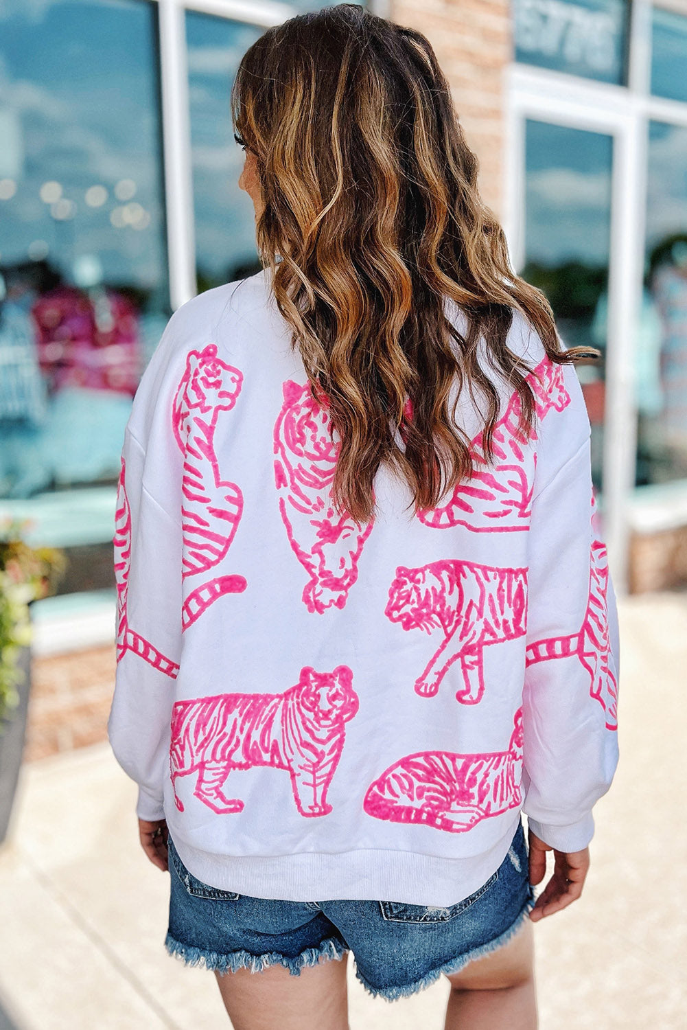 Felpa pullover con stampa animalier rosa bianco brillante