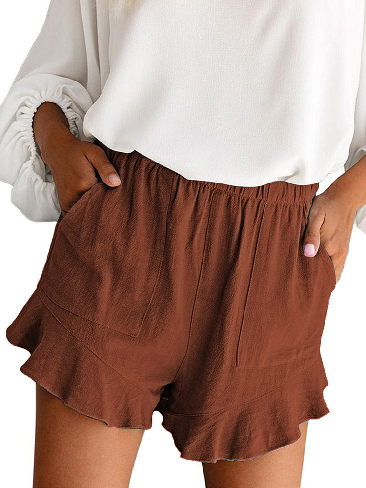 Aprikosenfarbene Shorts mit hoher Taille und Rüschentaschen