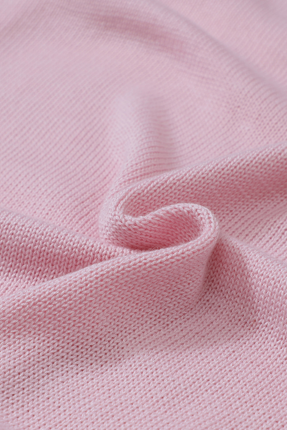 Rosafarbener lockerer Pullover mit ausgehöhlter Spitze und V-Ausschnitt