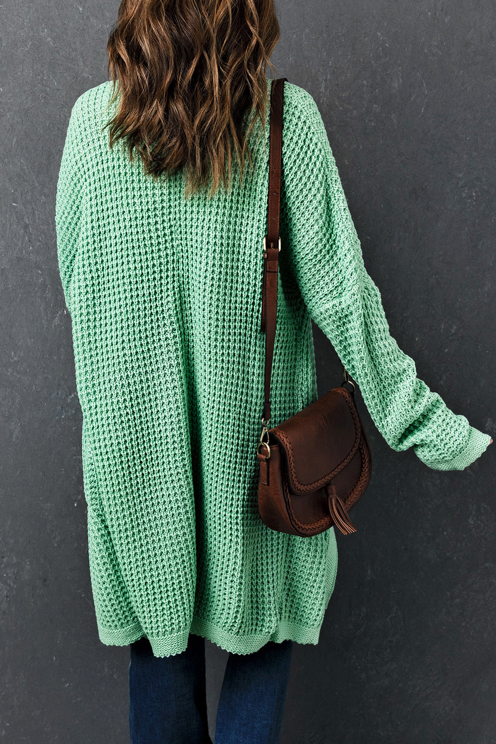 Cardigan tricoté vert long ouvert sur le devant avec poches