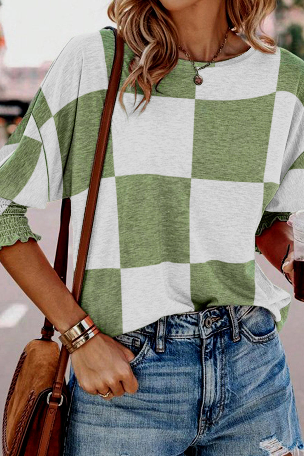 Travnato zelena mešana bluza s karirastim potiskom in striženimi manšetami