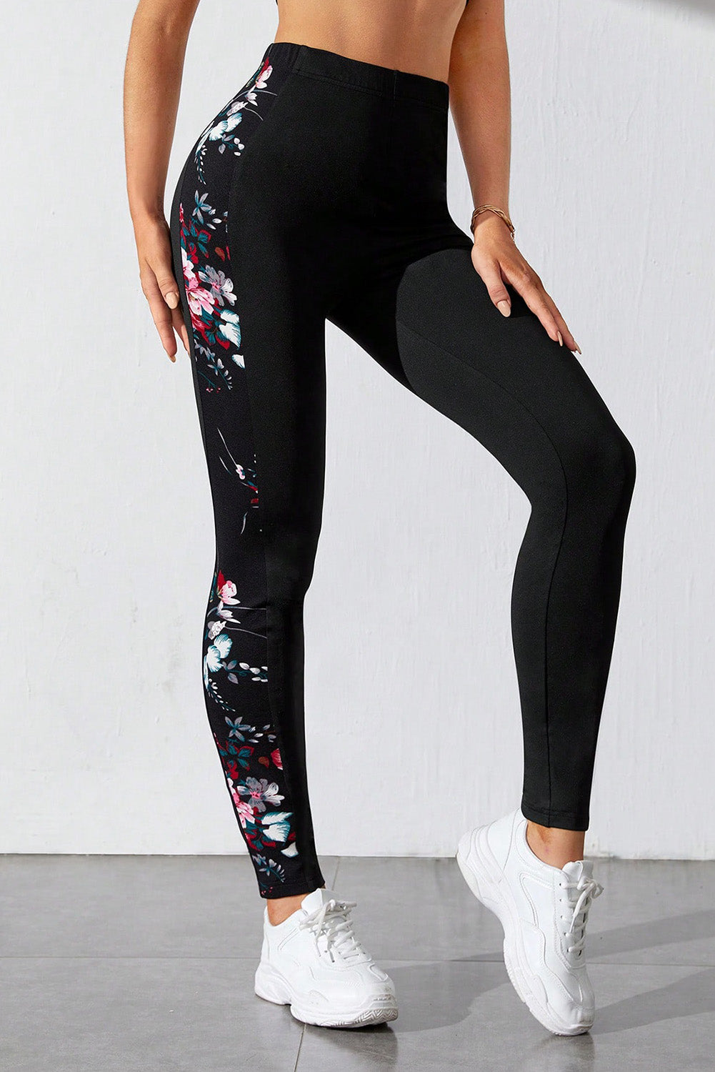 Leggings a vita alta con toppa con stampa floreale nera