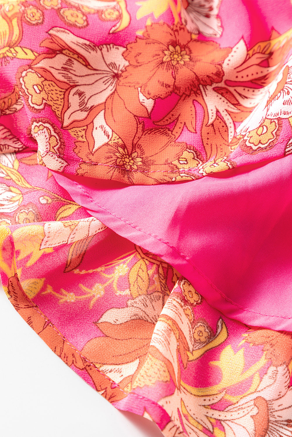 Robe fleurie rose à col carré et manches à volants