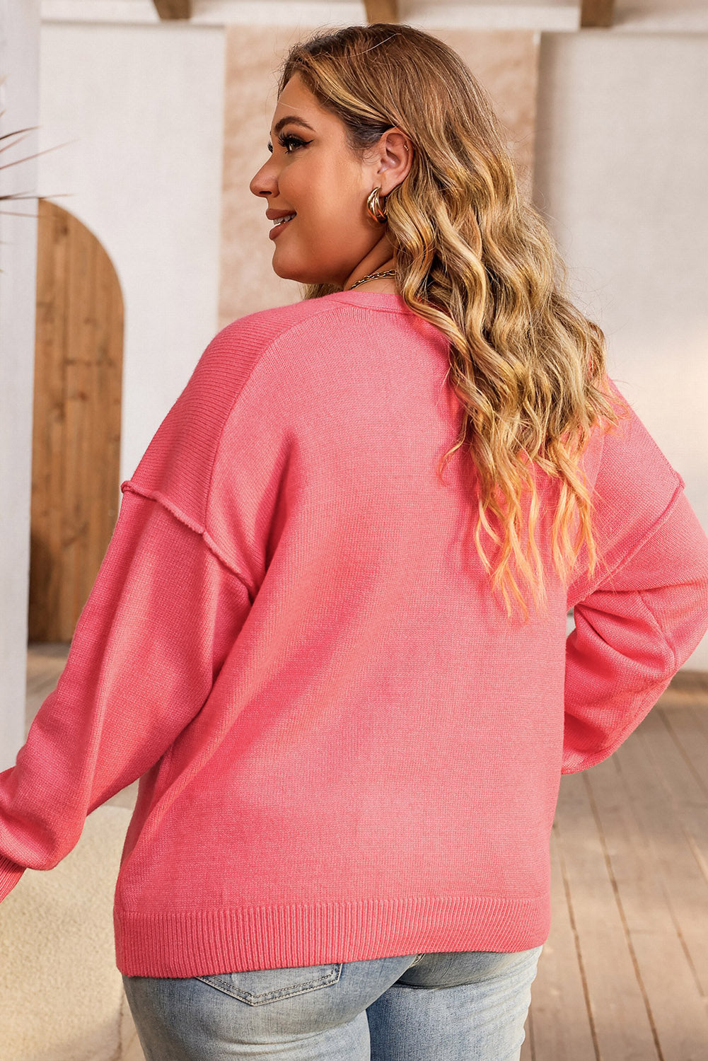 Maglione rosa con scollo a V con spalle scese taglie forti
