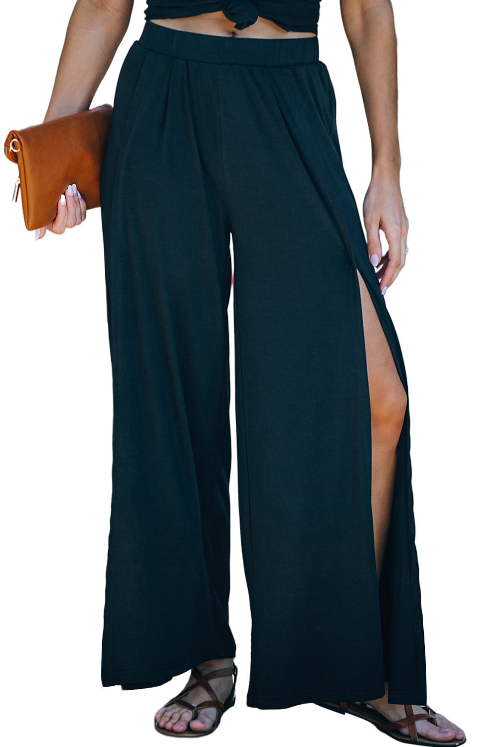 Pantalon noir taille moyenne à jambe large et fente latérale